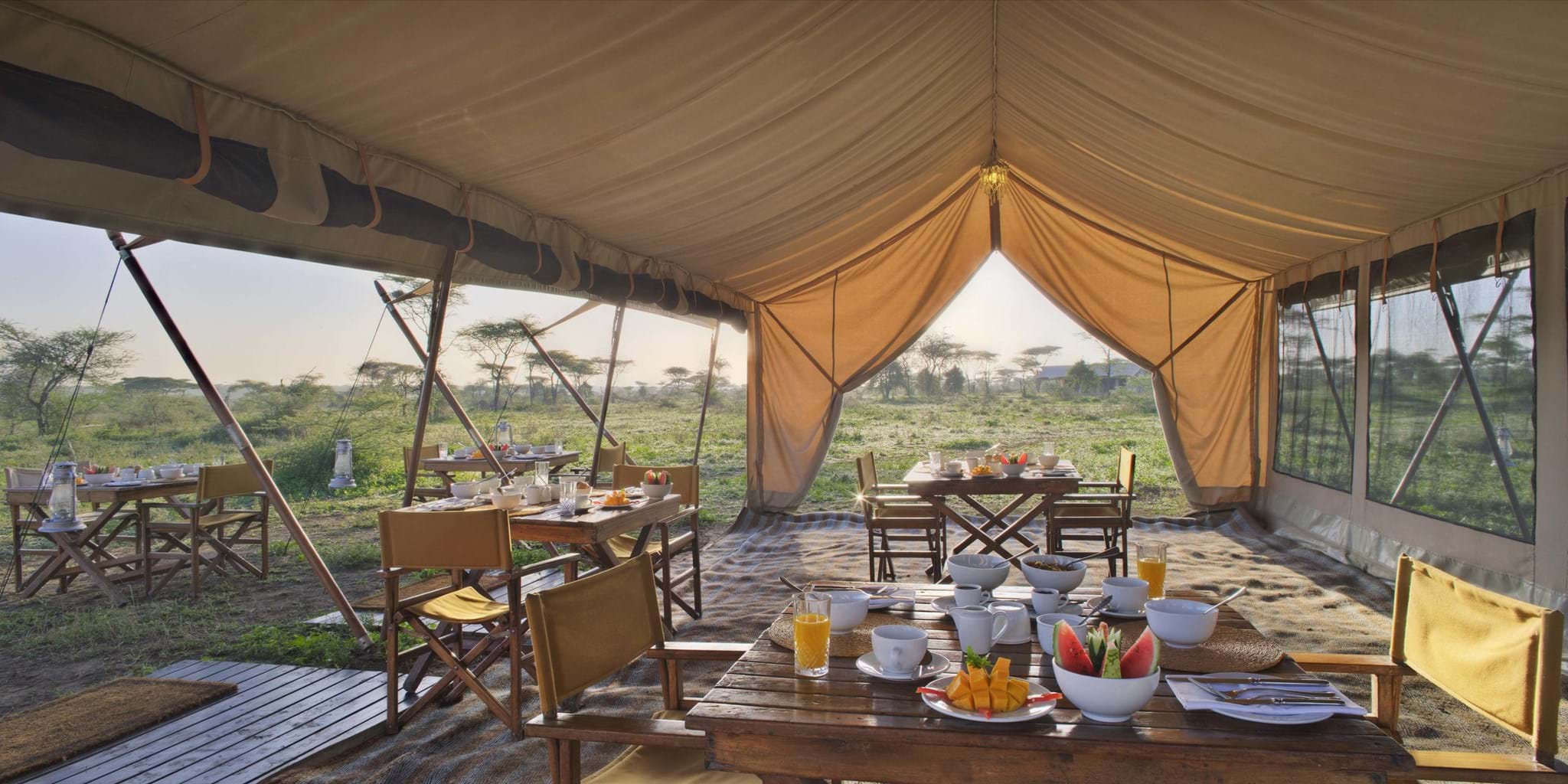 Exclusive luxury tented suite at a top-tier Tanzania safari concession camp with private plunge pool and Serengeti views — the standard of the best private safaris in Tanzania