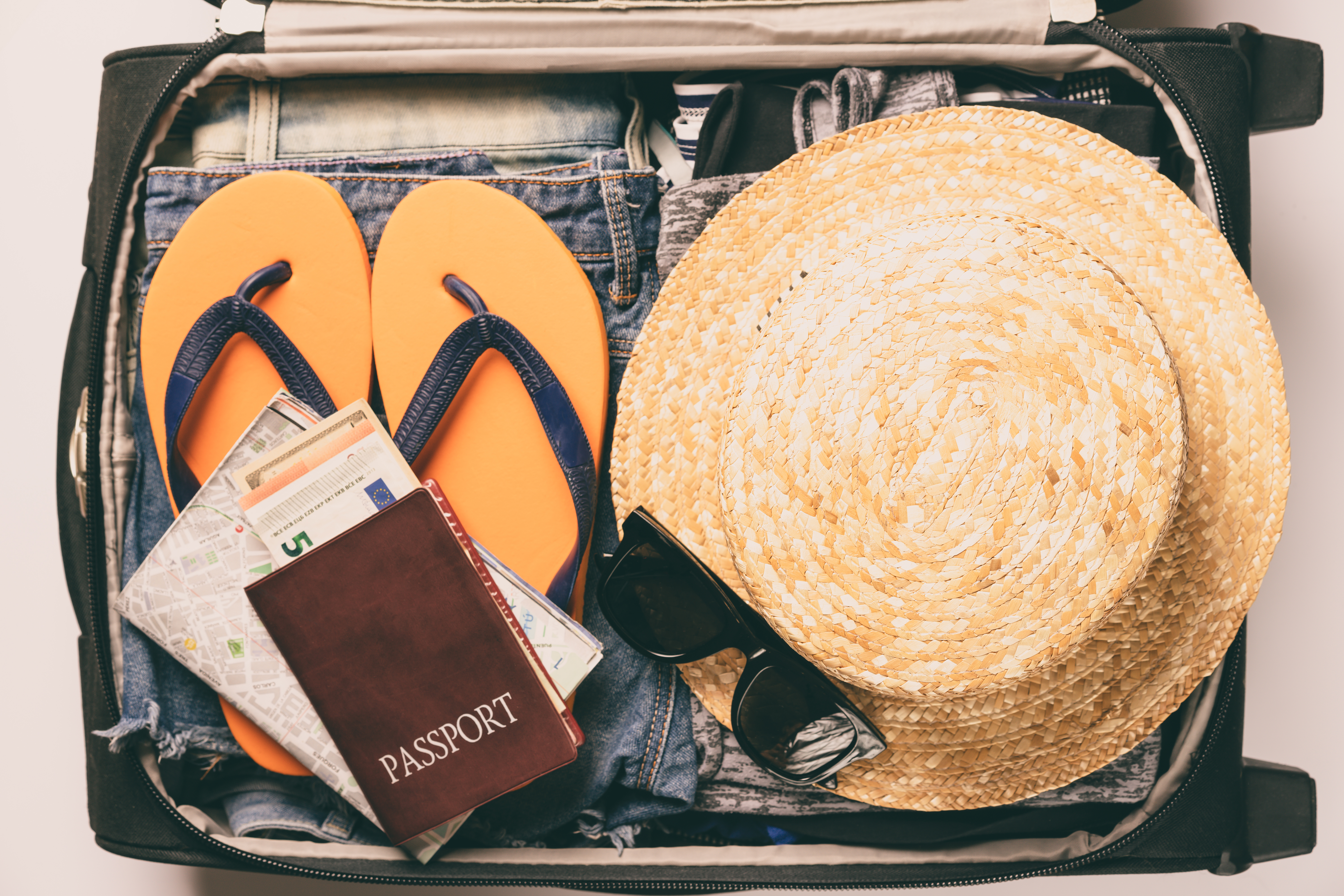 Organised safari packing with soft duffel bag and essential items only, demonstrating smart packing for a Tanzania luxury safari